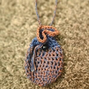 Hand knitted pouch